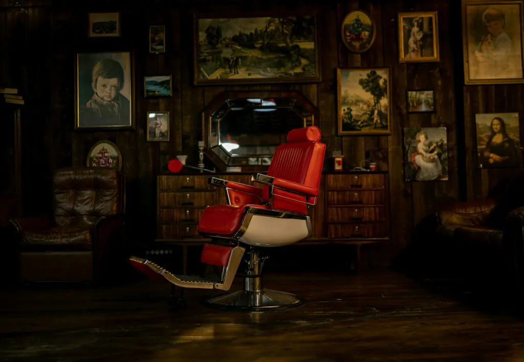 a red chair in a barbershop